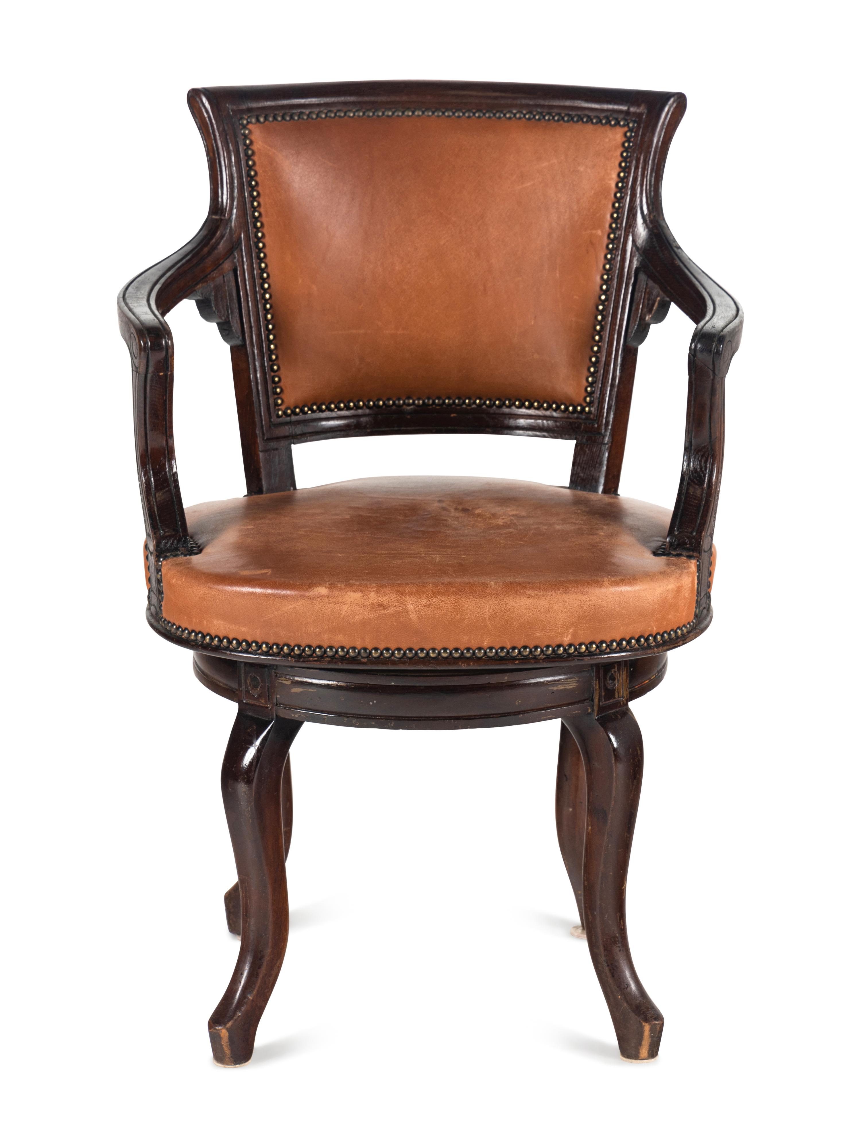 A Directoire Style Leather-Upholstered Swiveling Armchair