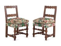 A Set of Four Italian Renaissance Style Oak Side Chairs