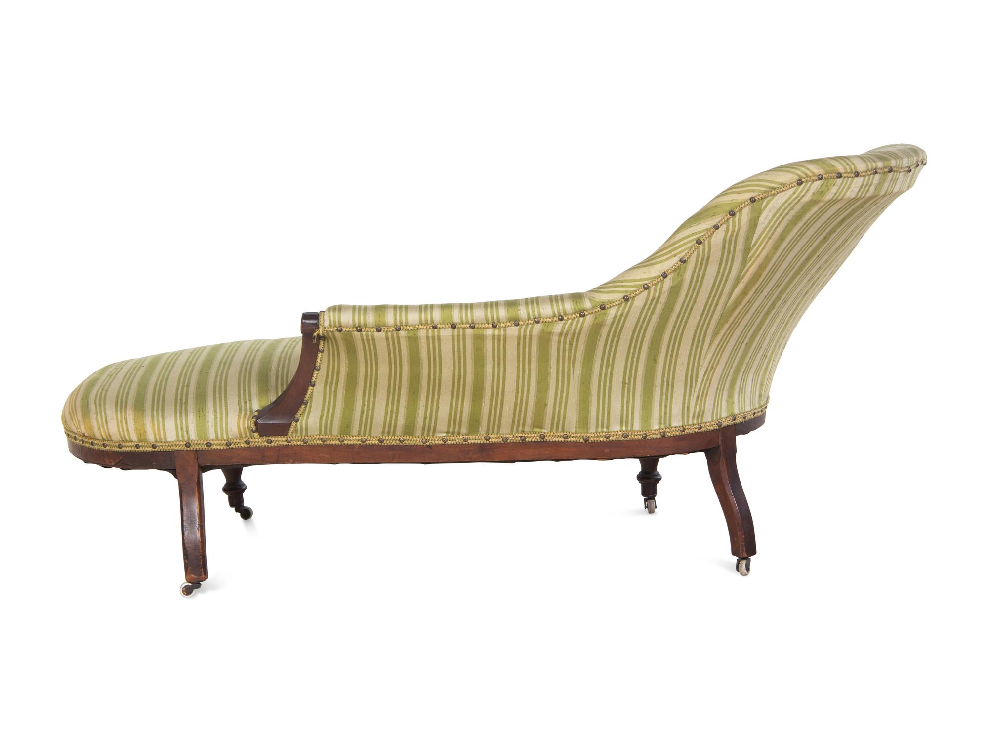 A Victorian Walnut Chaise Longue