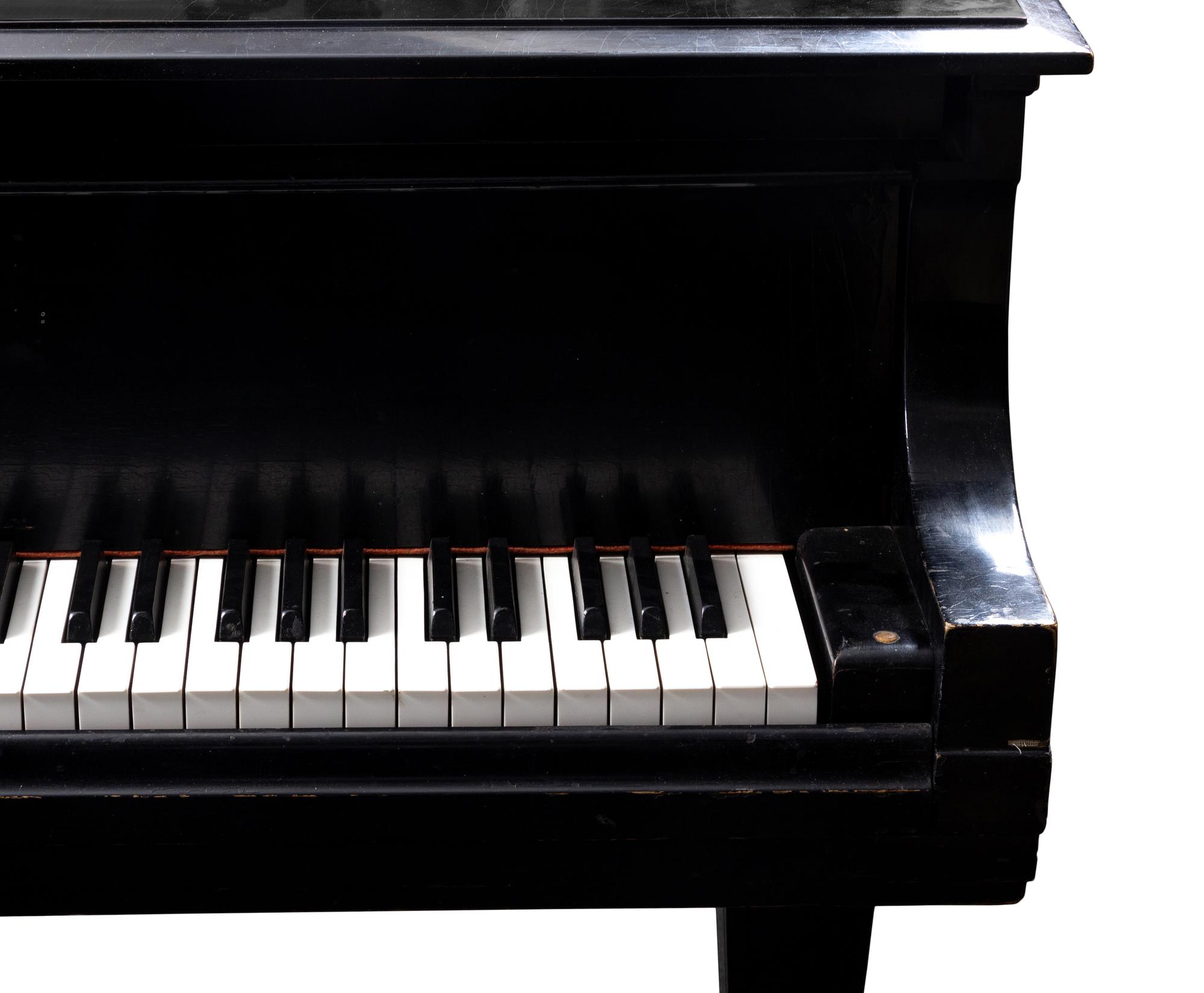 A Steinway and Sons Model L Black Lacquer Baby Grand Piano