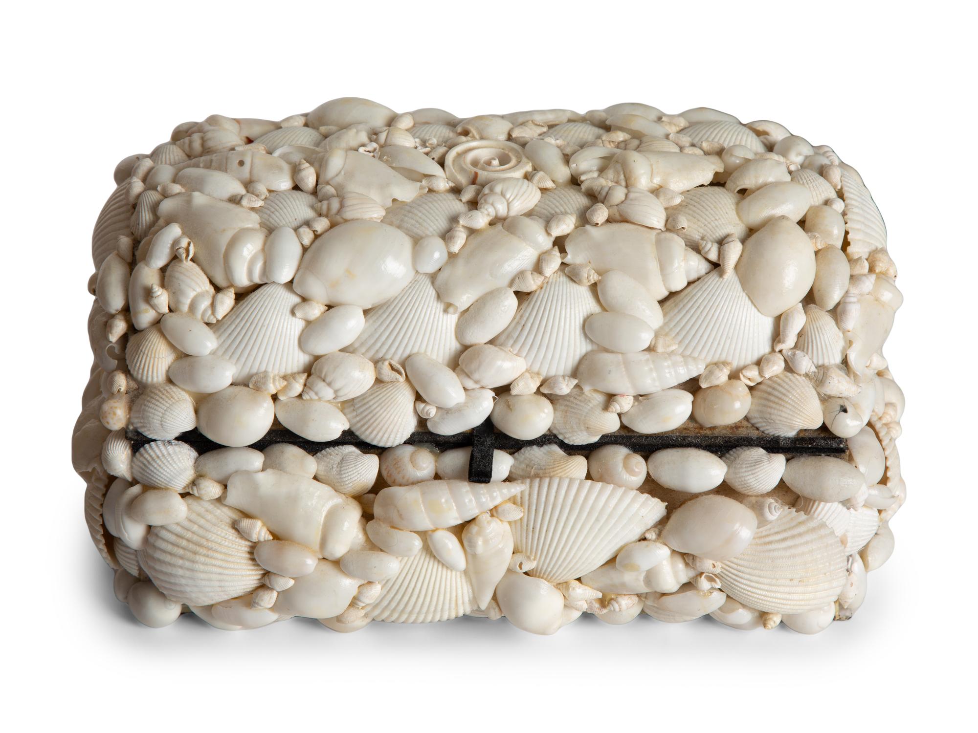 Two French Shell-Encrusted Lidded Boxes and a Pair of Cowry Shell Covered Baskets — 20TH CENTURY