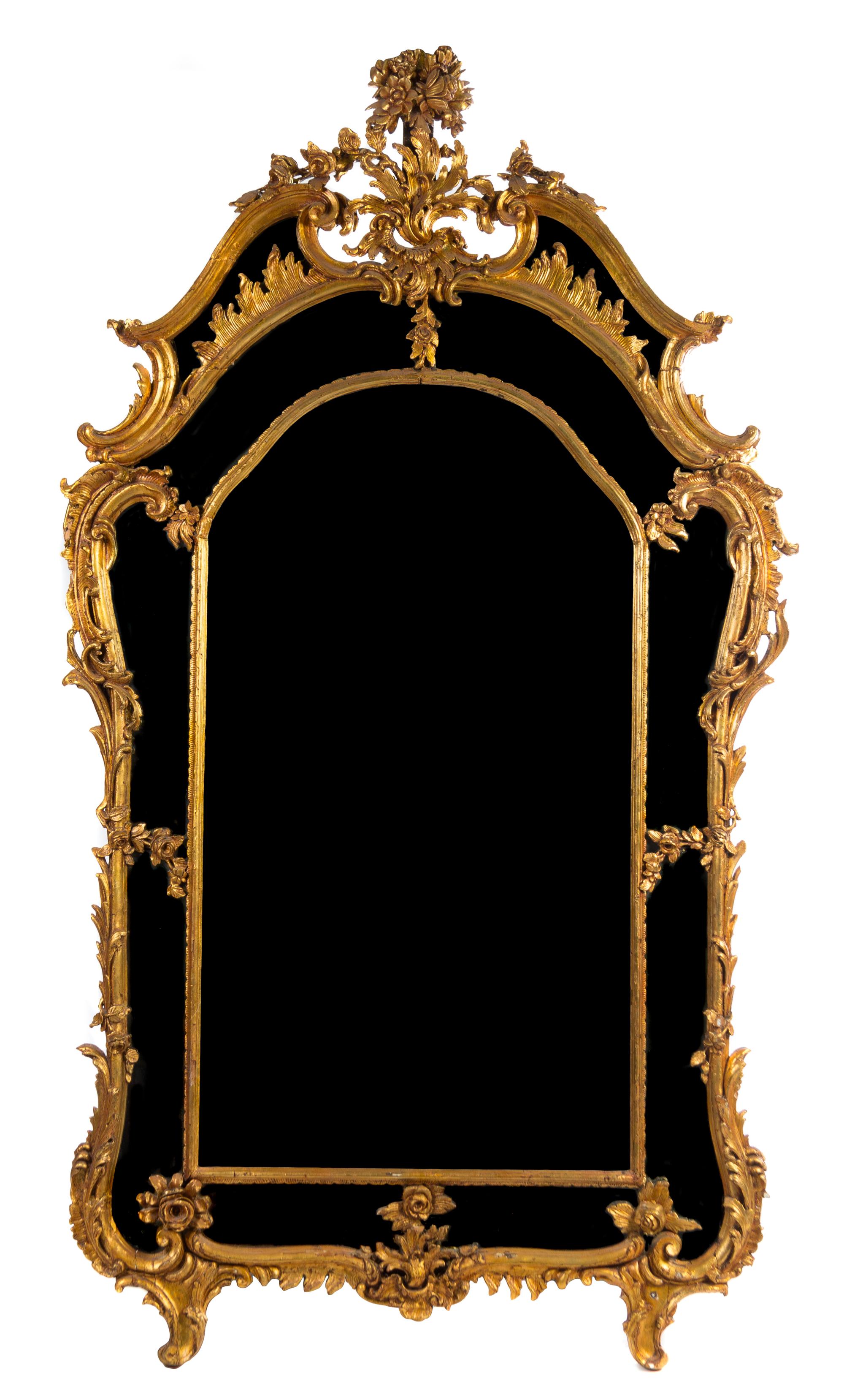 A Louis XV Style Giltwood Pier Mirror Height 89 x width 49 inches. — LATE 19TH CENTURY WITH LATER GILT