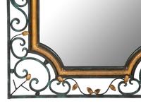 A Painted and Parcel Gilt Scrolled Wrought Iron Mirror