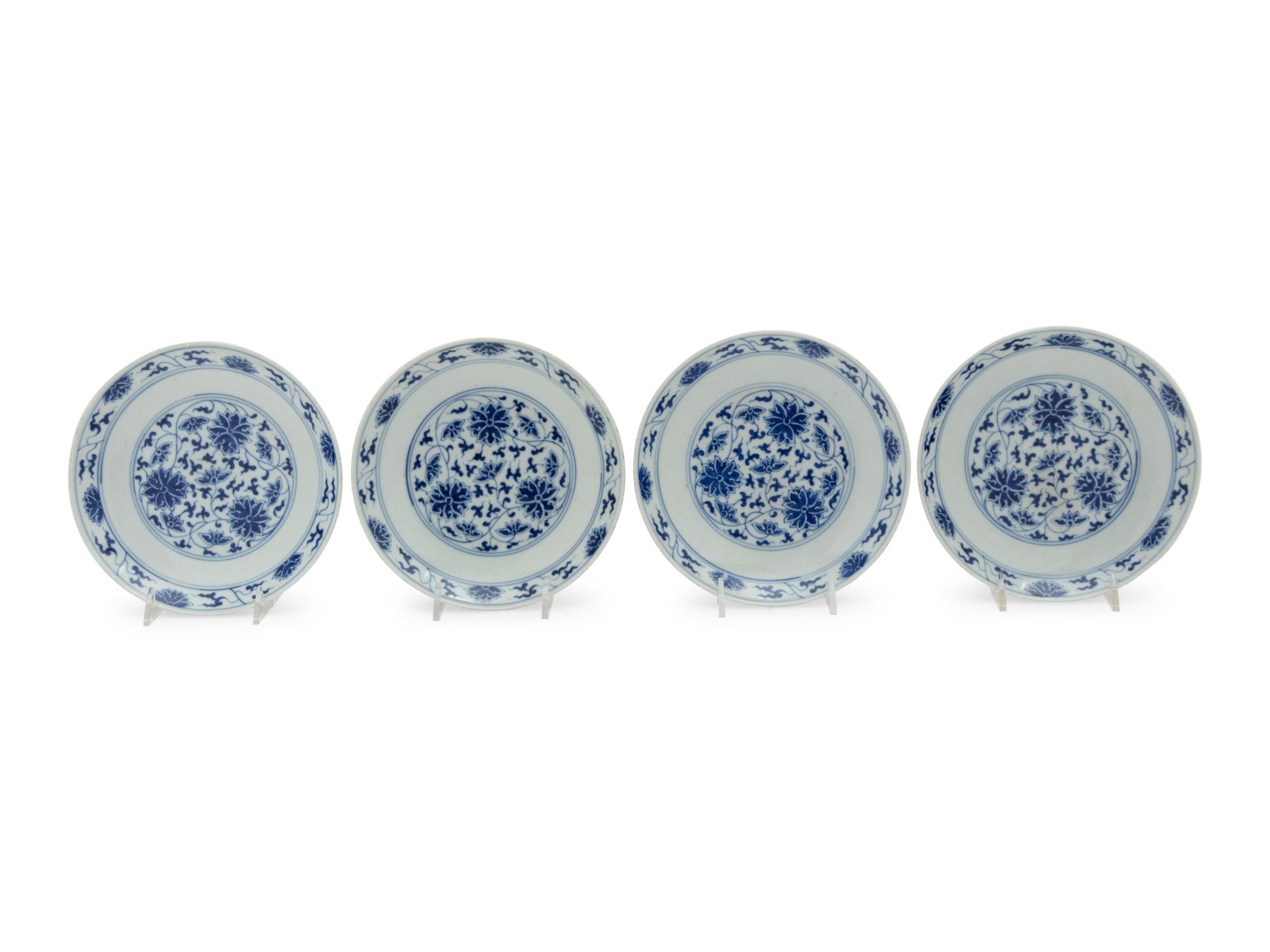 Four Chinese Blue and White Porcelain 'Lotus' Plates