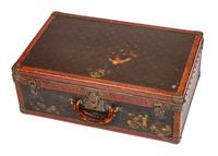 A Louis Vuitton Monogram Canvas Hardsided Suitcase, 15.5" H x 23.75" W x 8" D; Handle drop: 2.25".