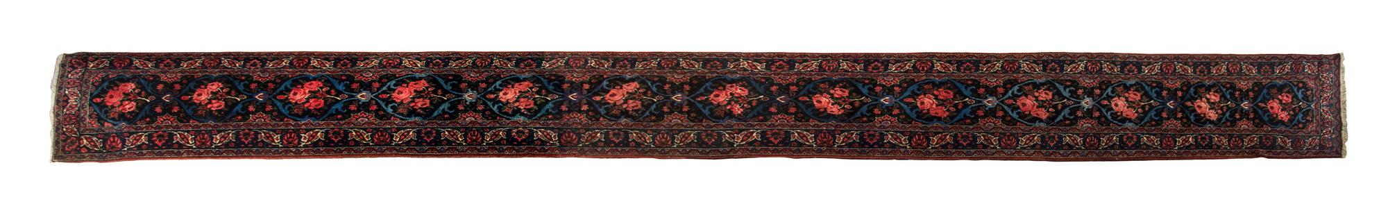 A Bakhtiari Wool Runner 22 feet x 2 feet 9 inches.