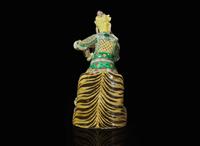 A Chinese famille verte figure of Guangmu Tianwang, guardian king of the West 素三彩造像一尊