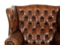 A George III Style Leather Wingback Armchair