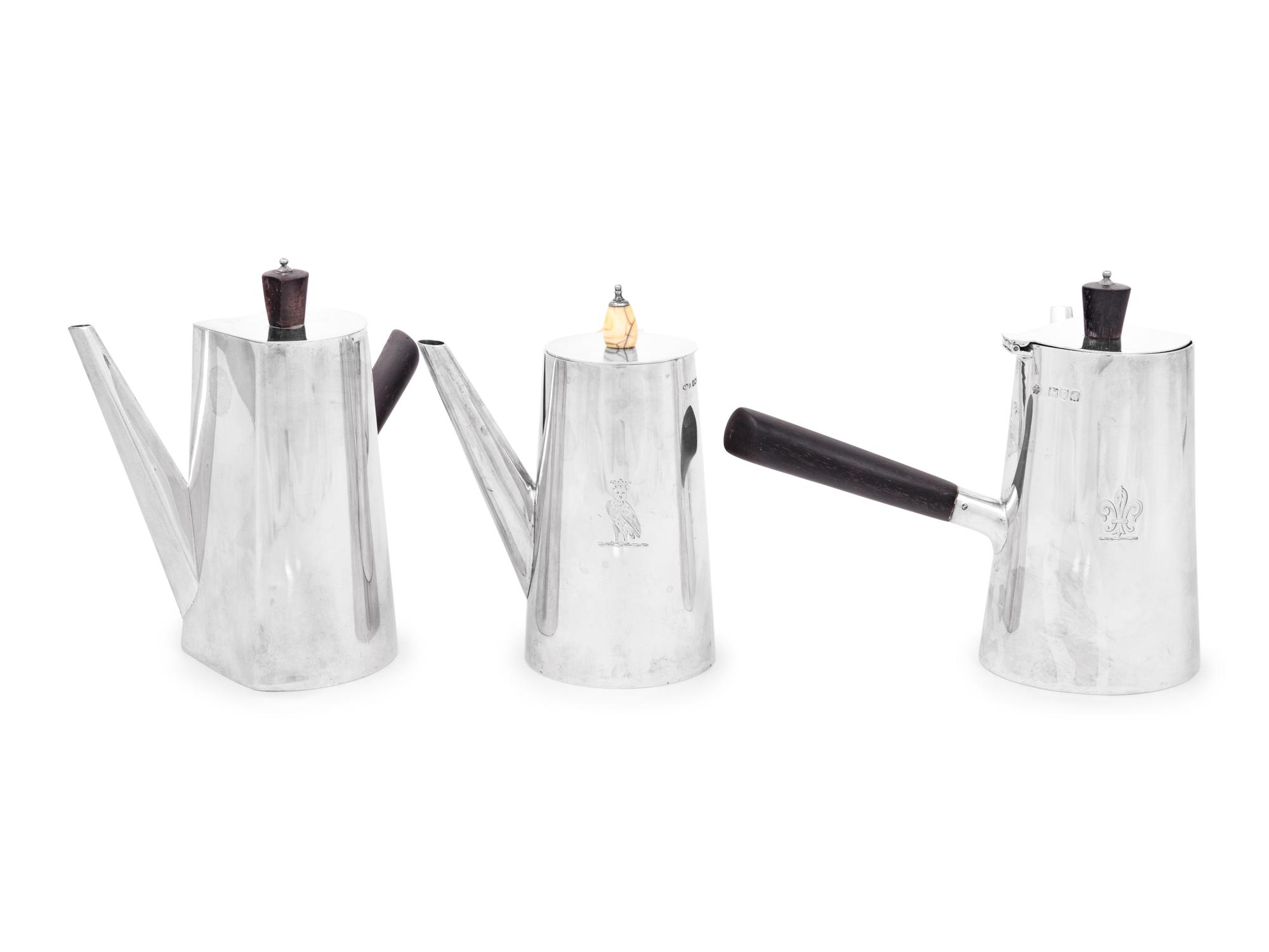 Two Victorian Silver Bachelor's Coffee Pots