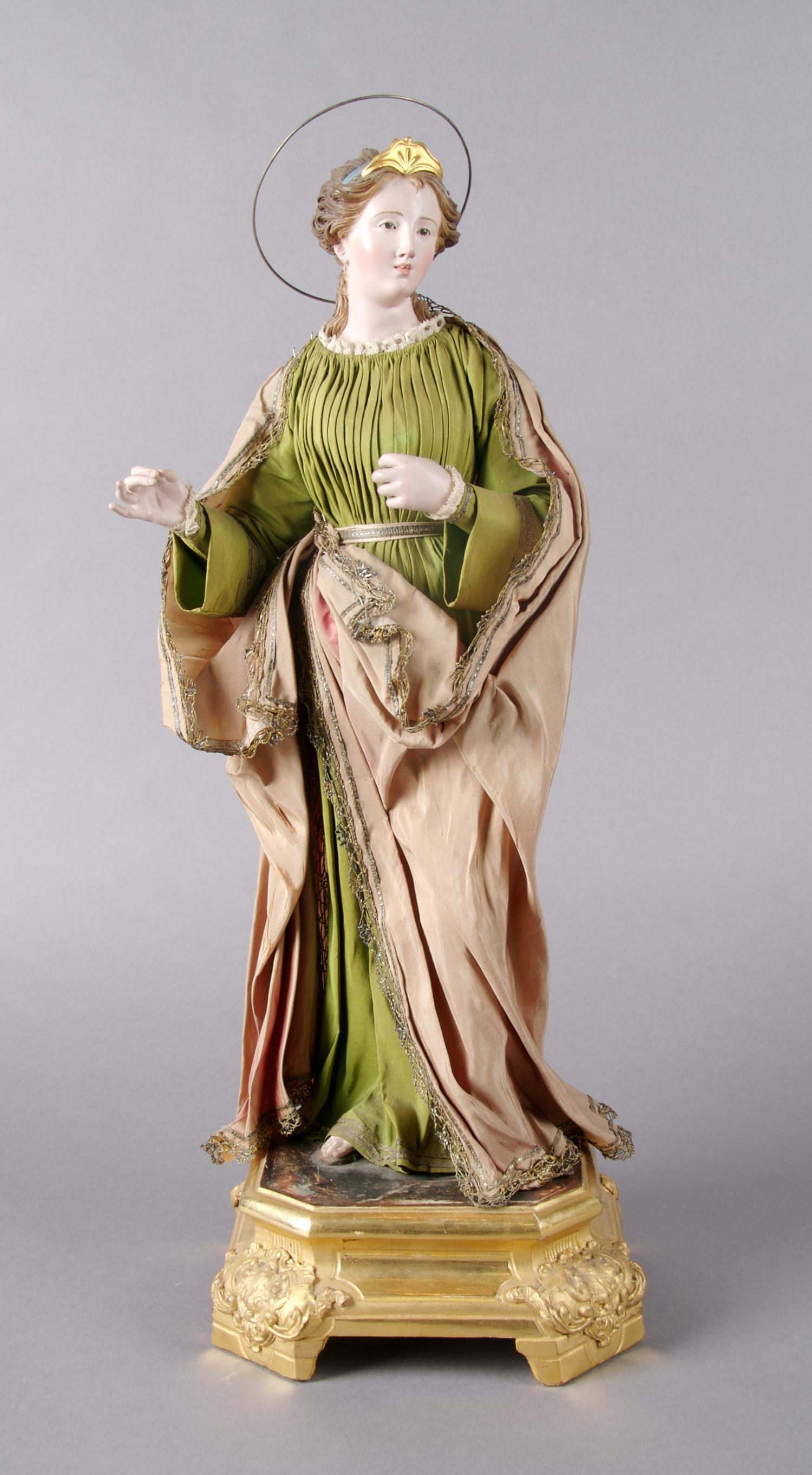 A French Papier Mache Figure of a Female Saint, Height overall 20 inches.