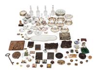A Box Lot Containing a Collection of Wooden Molds, Porcelain Articles, and a Set of Glass Decanters with Cordials