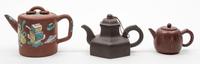 Three Yixing Pottery Teapots Diameter of largest 4 inches.