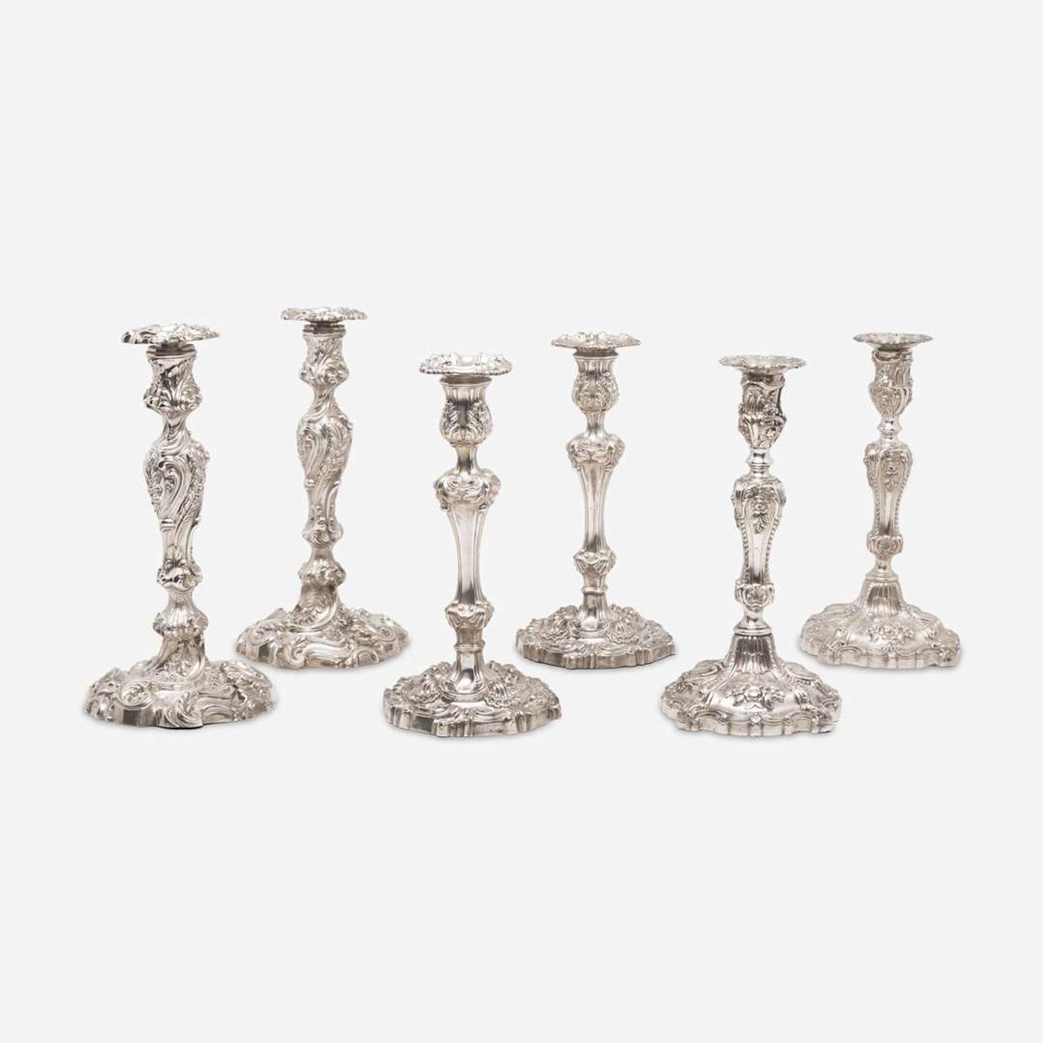 Three pairs of George III / Victorian weighted sterling silver candlesticks in the Rococo manner Various makers, Sheffield, dates ranging 1818-1846