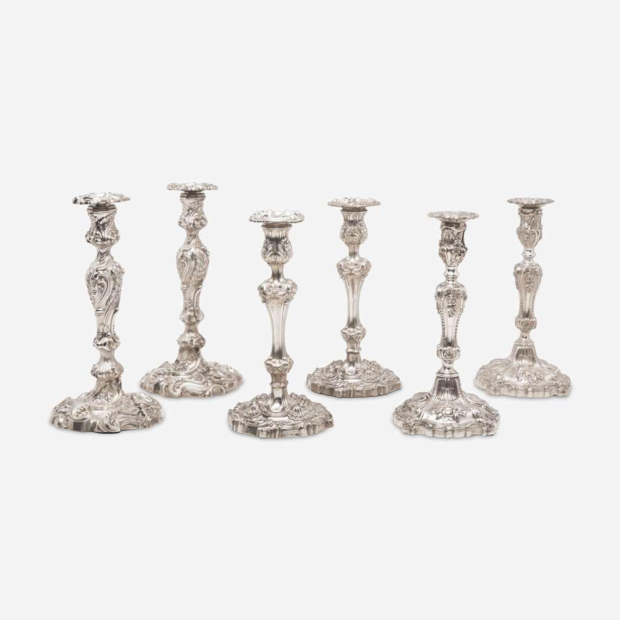 Three pairs of George III / Victorian weighted sterling silver candlesticks in the Rococo manner Various makers, Sheffield, dates ranging 1818-1846