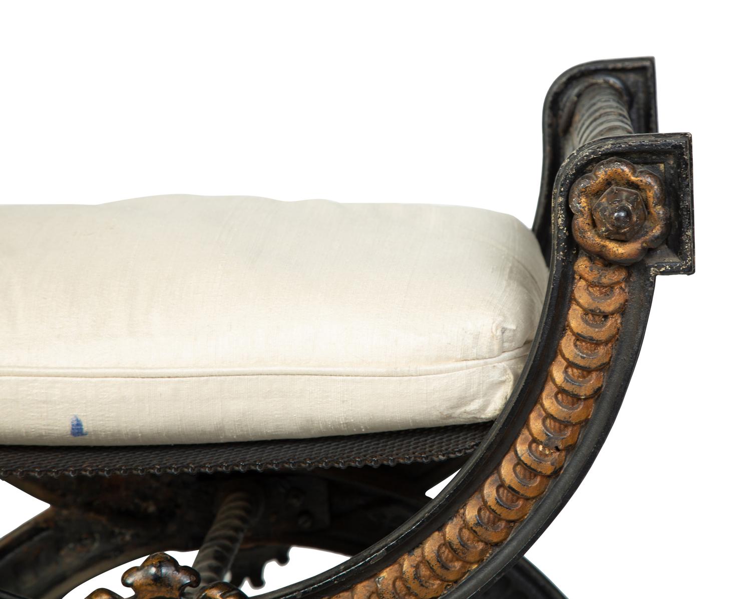 A Pair of Continental Cast Iron and Parcel Gilt Curule-form Tabourets — 19TH/20TH CENTURY