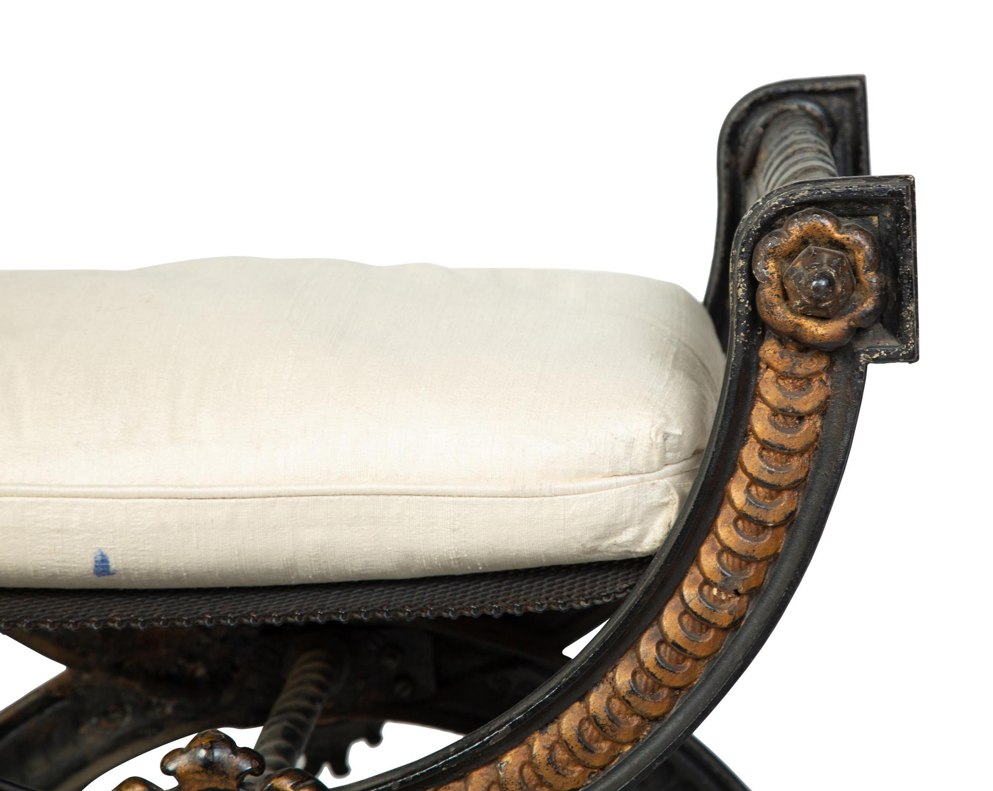 A Pair of Continental Cast Iron and Parcel Gilt Curule-form Tabourets — 19TH/20TH CENTURY