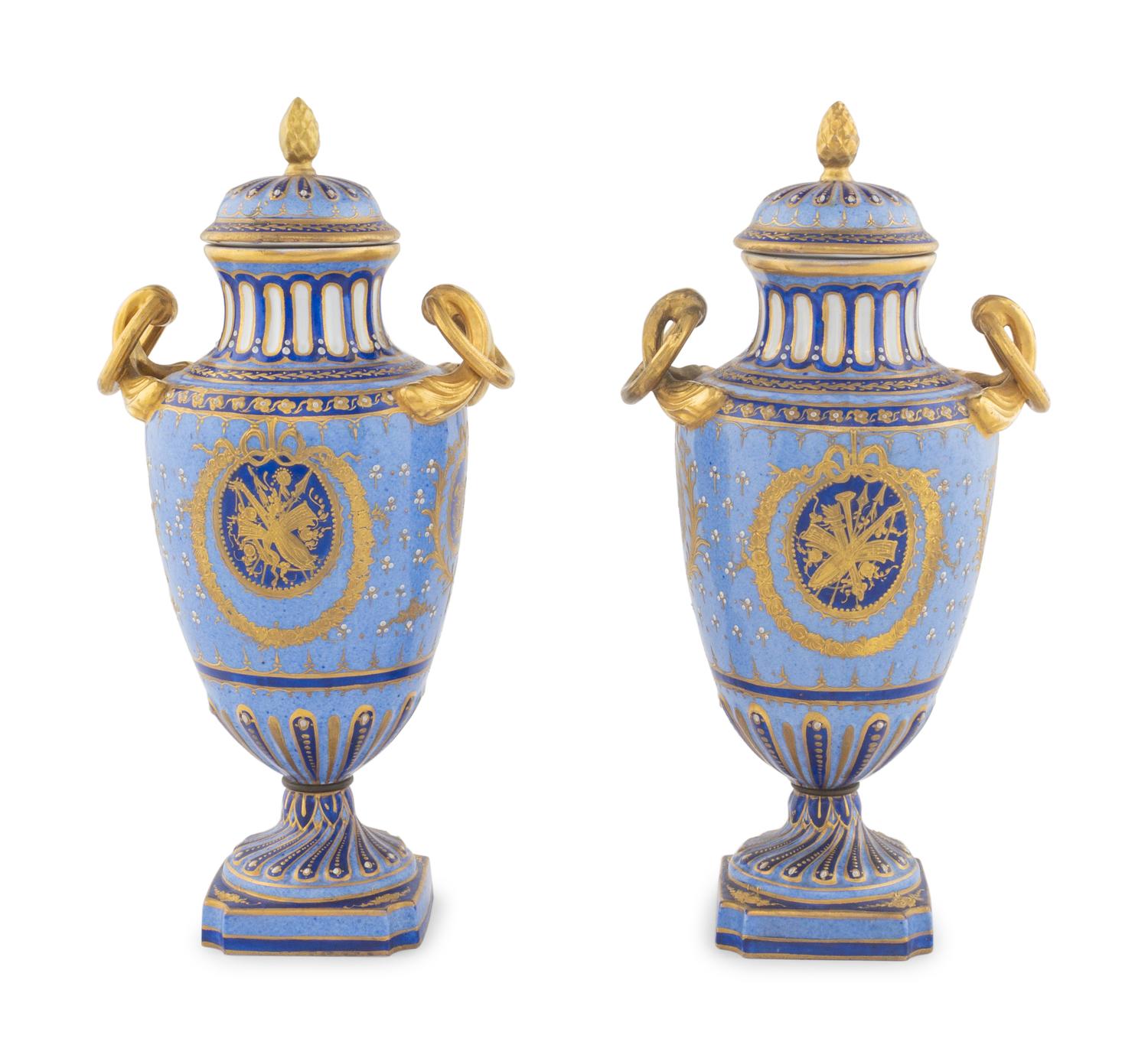 A Pair of Sèvres Porcelain Covered Urns