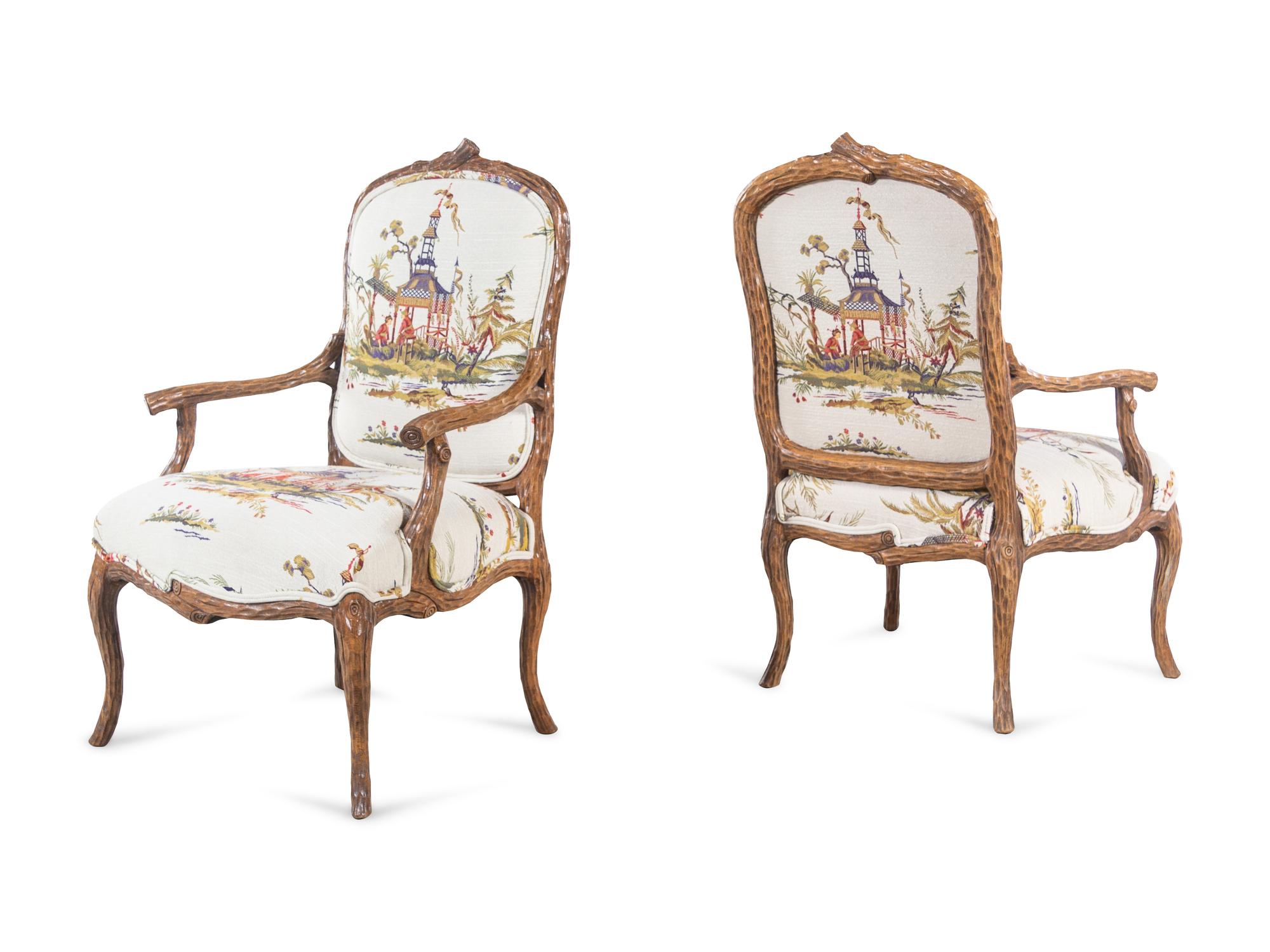A Pair of Louis XV Style Faux Bois-Carved Fauteuils