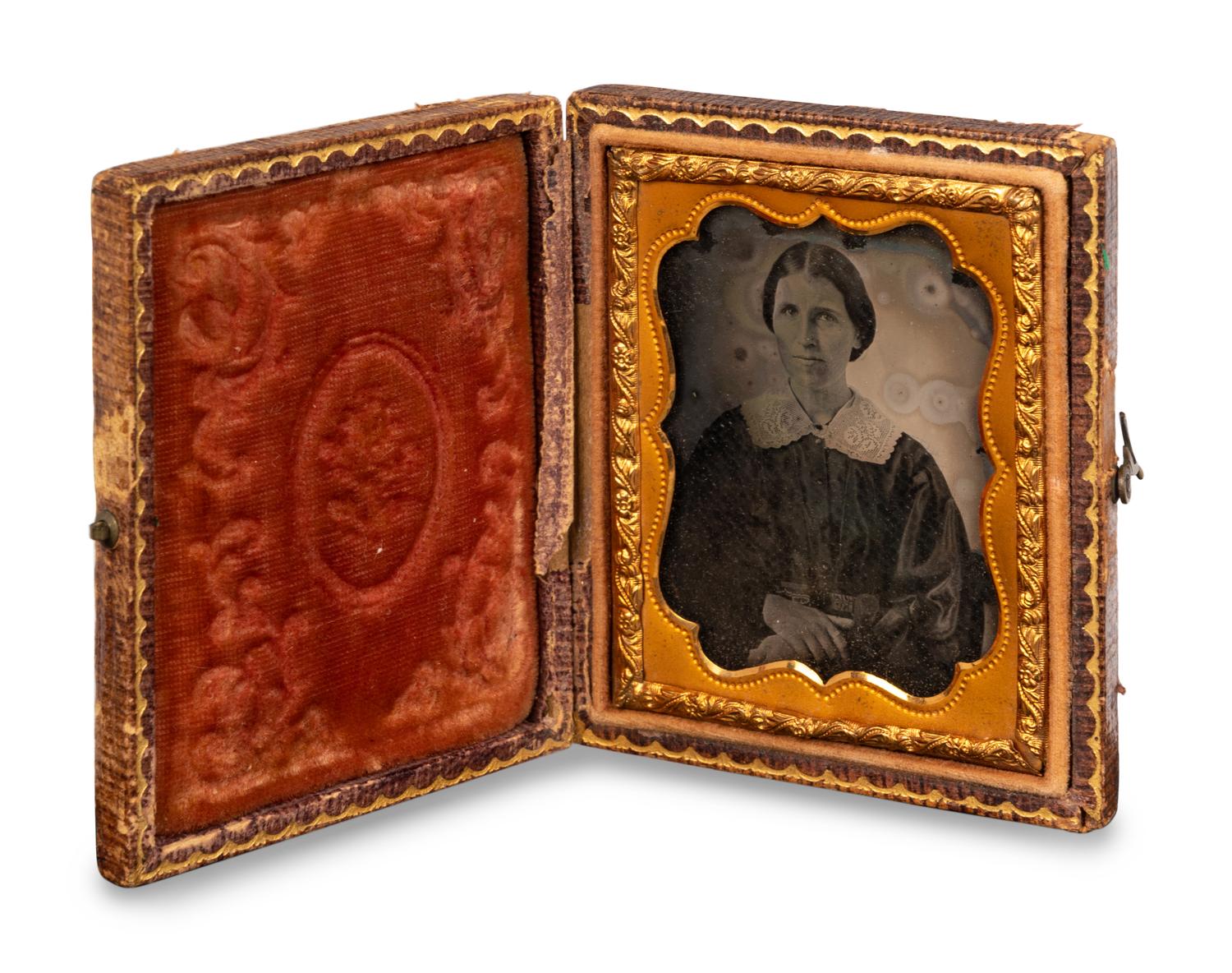 A Group of Four Tintypes of Men and a Woman
