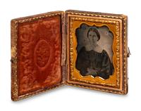 A Group of Four Tintypes of Men and a Woman