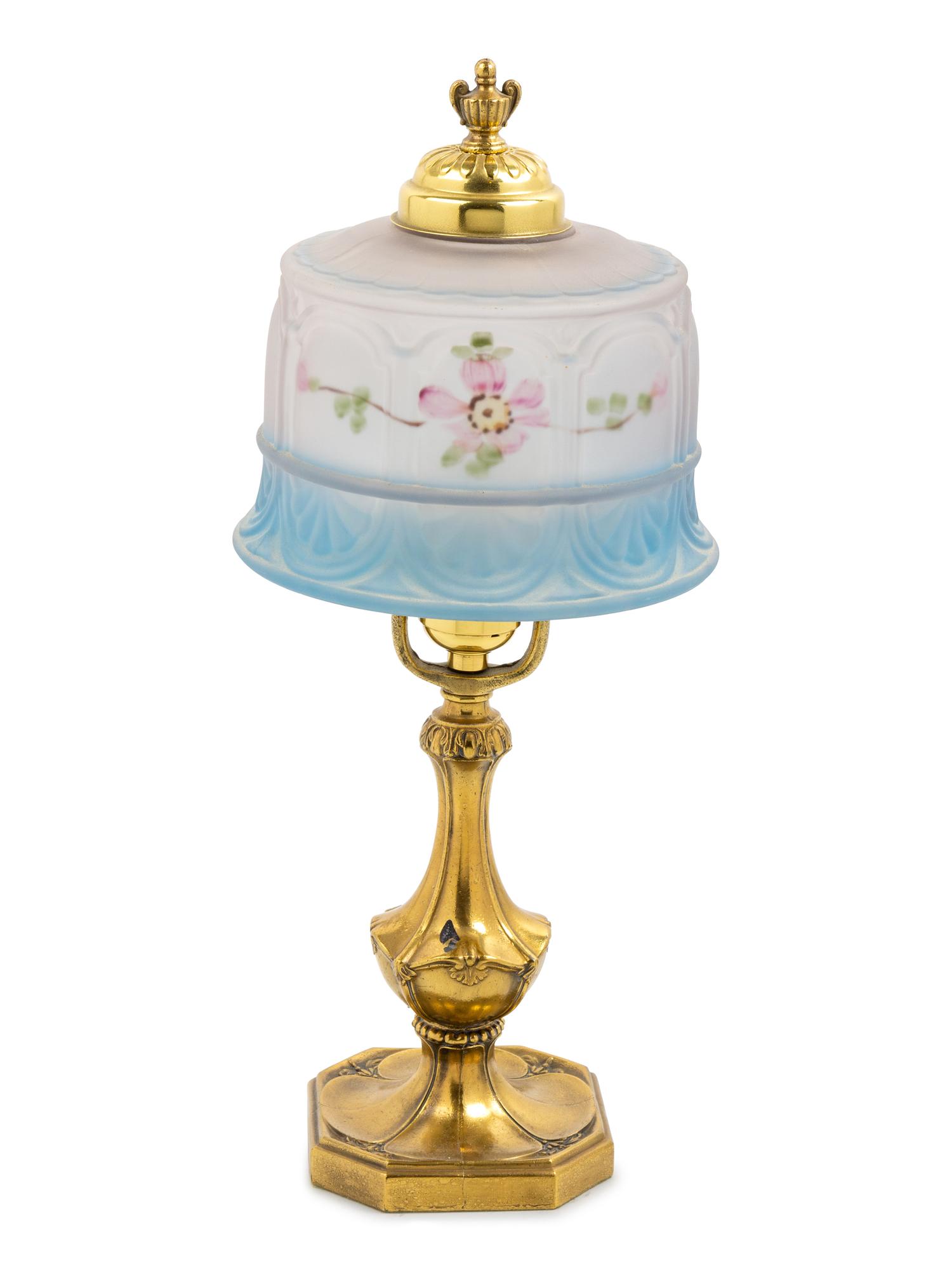 A Brass and Reverse Painted Glass Lamp