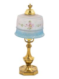 A Brass and Reverse Painted Glass Lamp