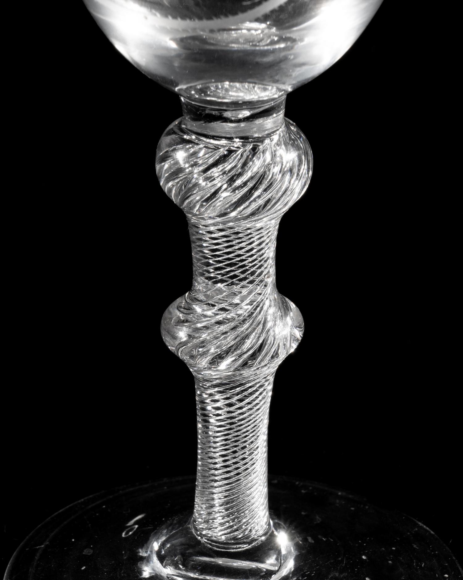 A Hanoverian Engraved Air Twist Wine Glass