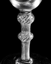 A Hanoverian Engraved Air Twist Wine Glass