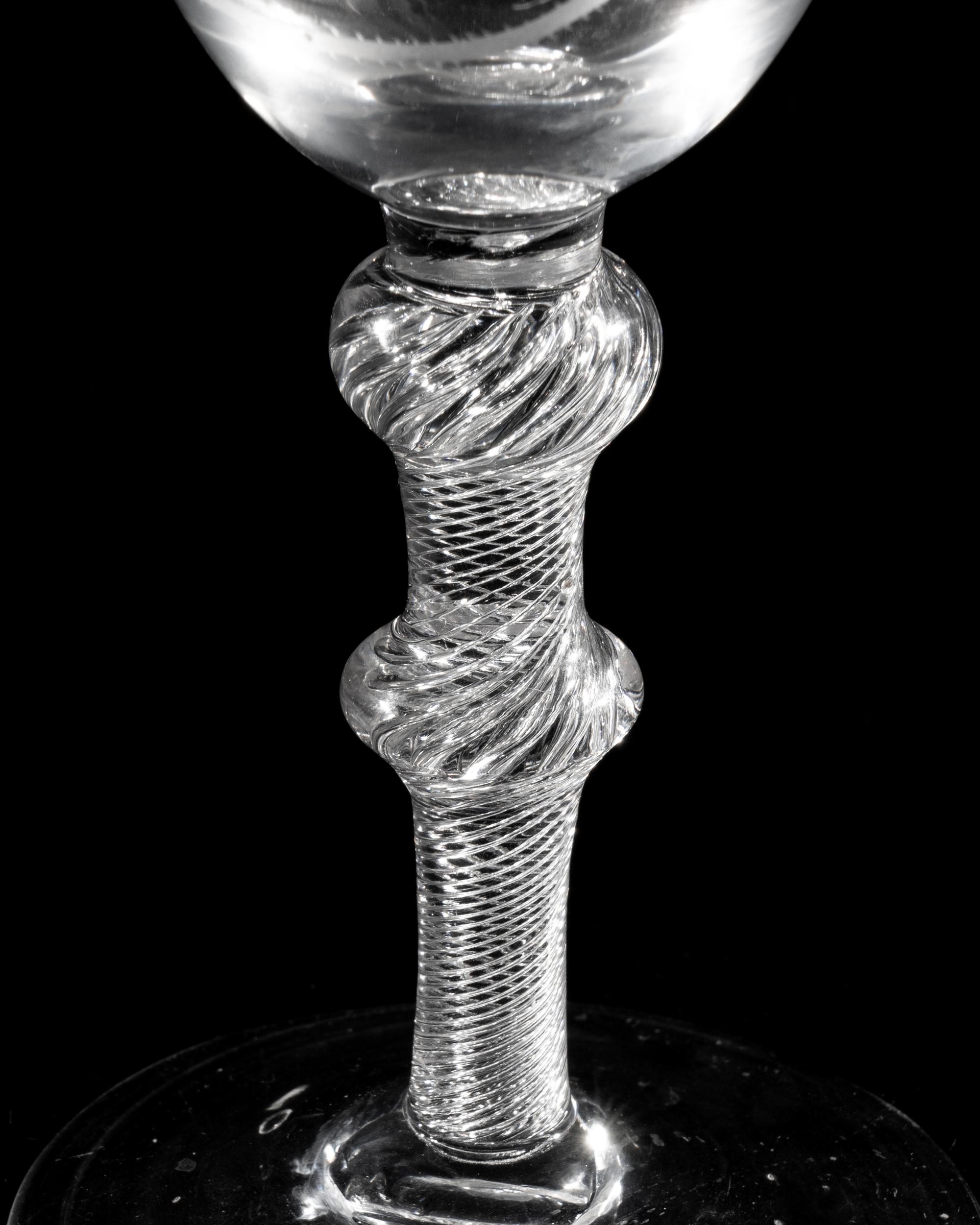 A Hanoverian Engraved Air Twist Wine Glass