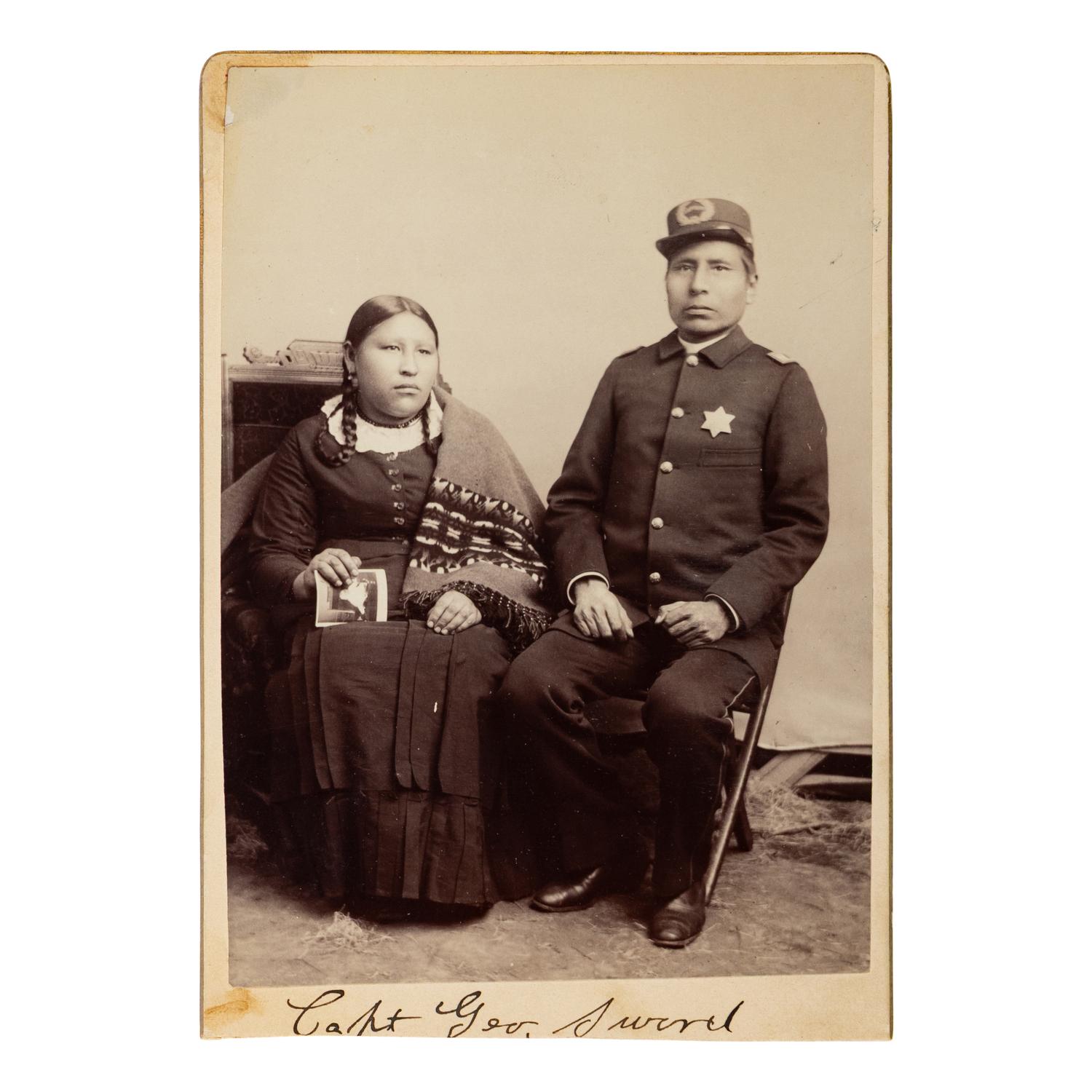 [Native Americana]. Cabinet card of Pine Ridge Tribal Police Captain George Sword and wife.