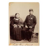 [Native Americana]. Cabinet card of Pine Ridge Tribal Police Captain George Sword and wife.