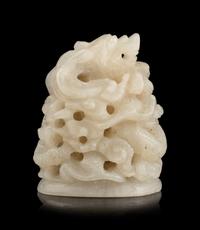 A Chinese Carved White Jade Finial