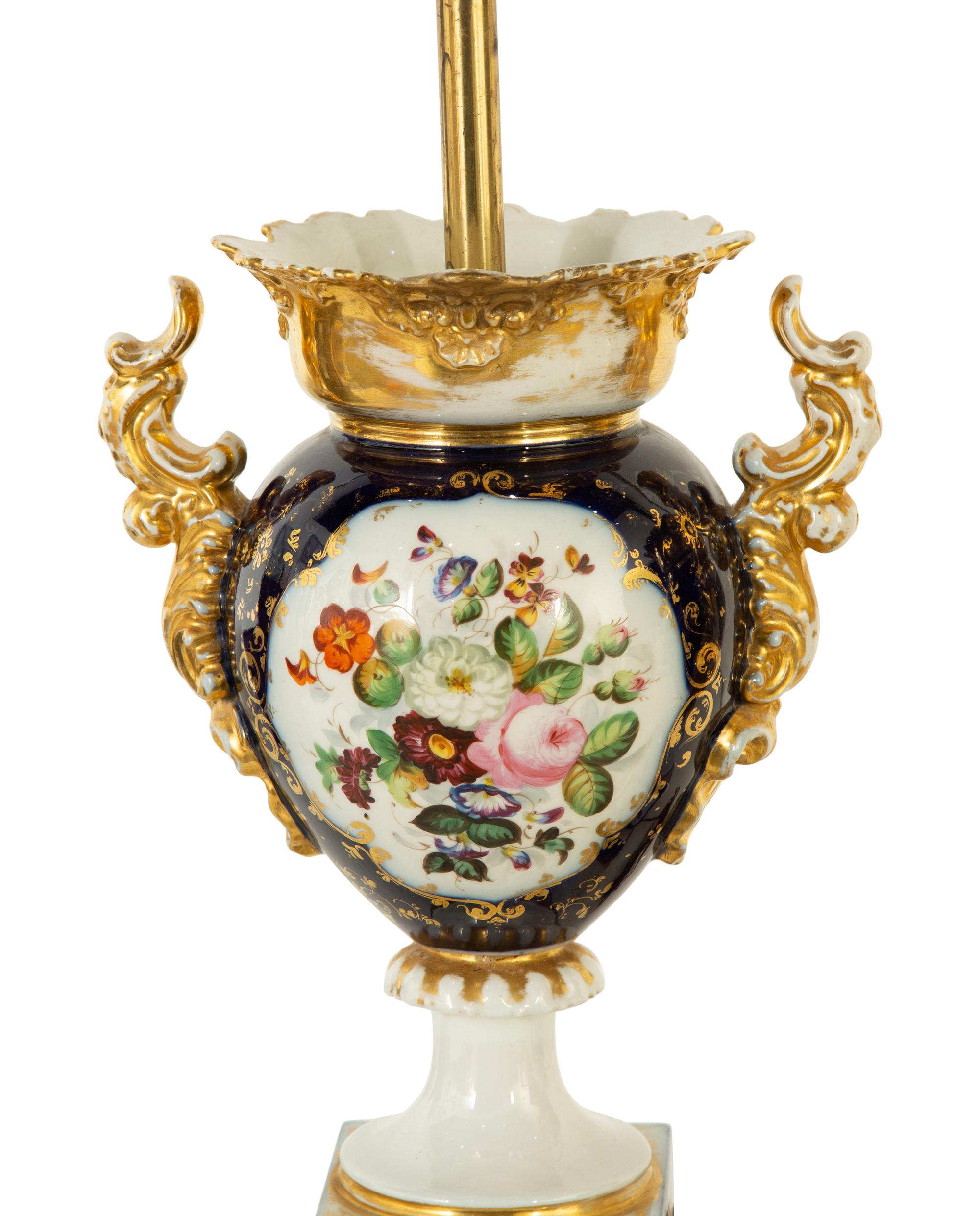 A Pair of French Porcelain Urns Mounted as Lamps