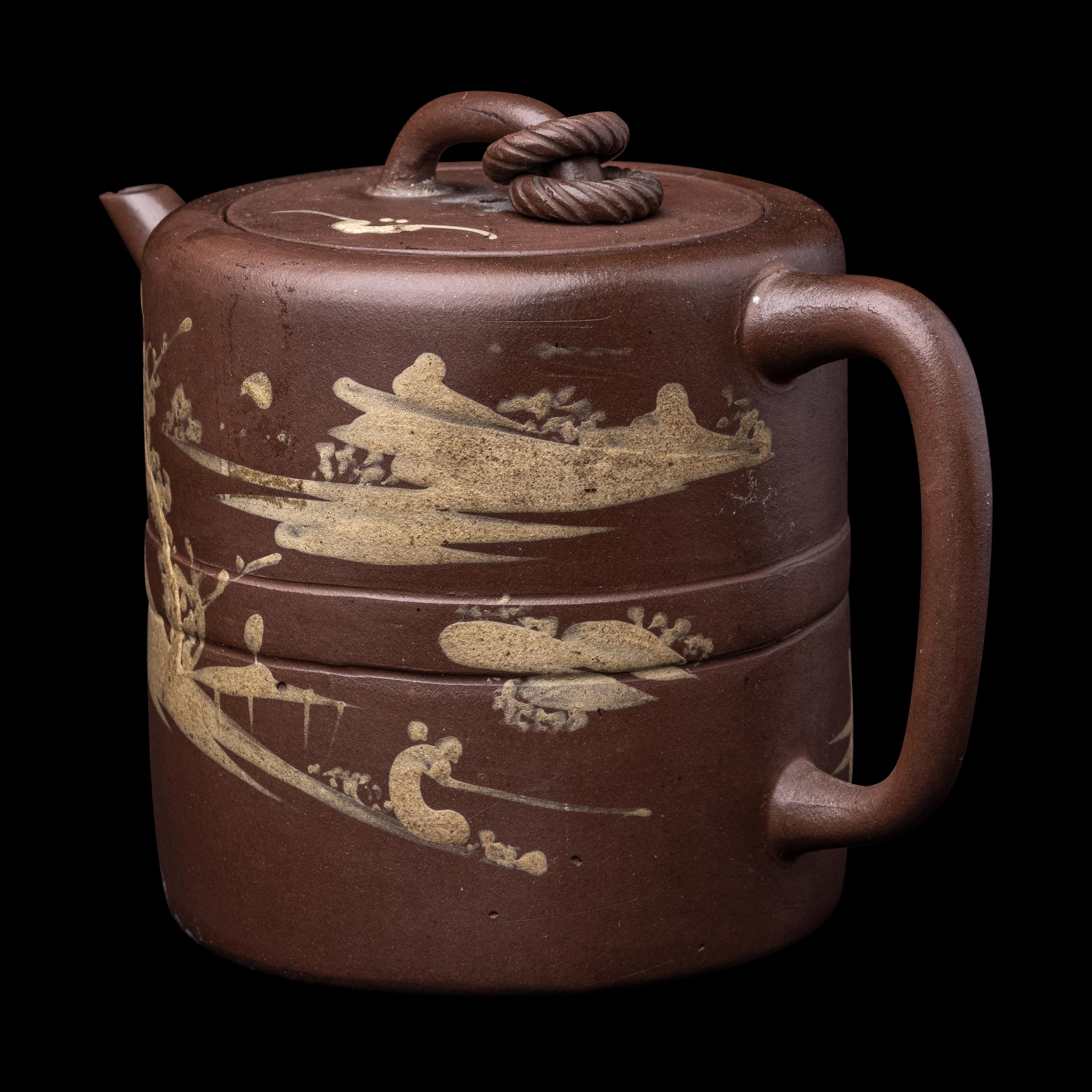 A Chinese Yixing Stoneware Covered Teapot