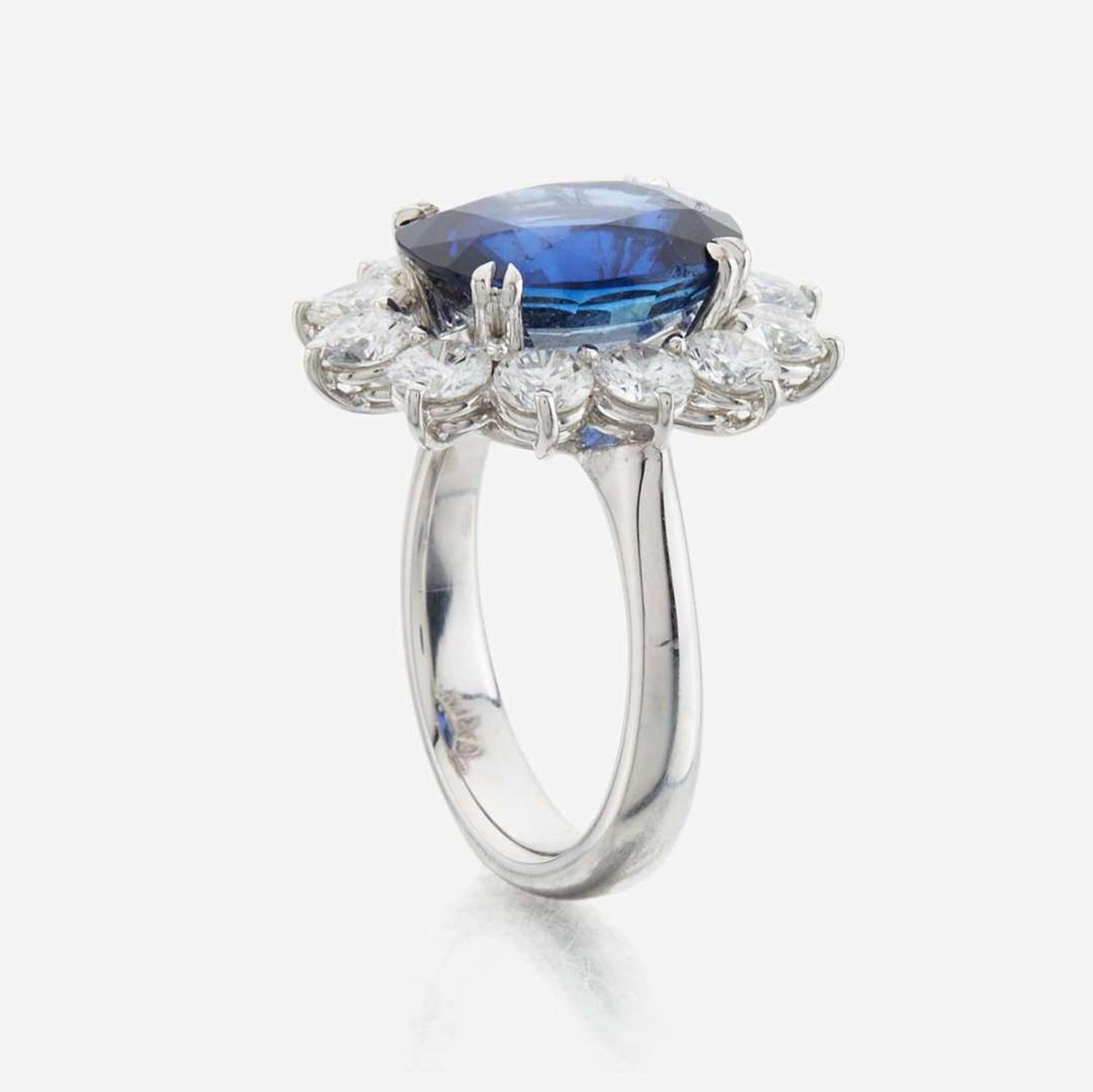 A sapphire, diamond and gold ring