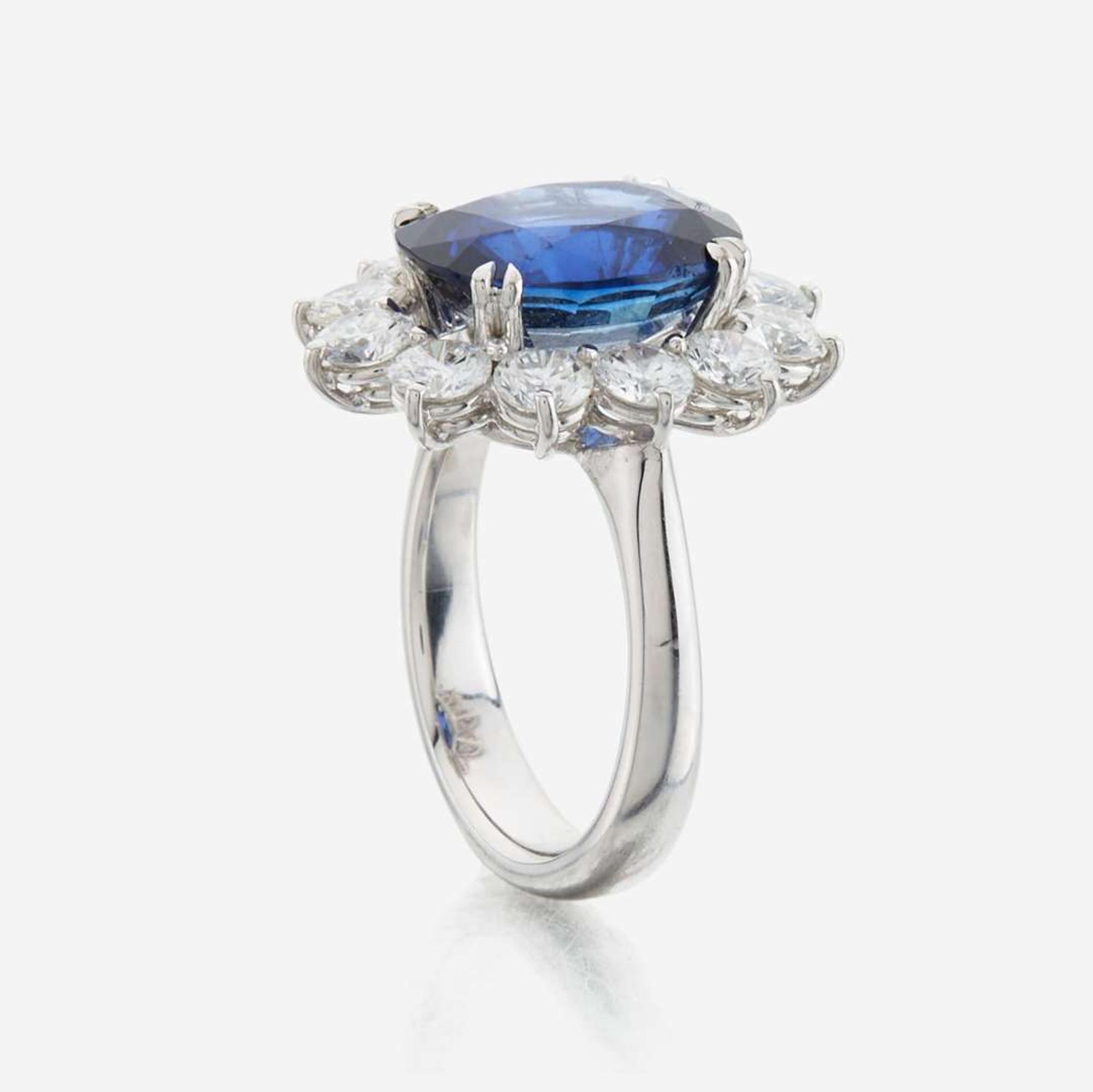 A sapphire, diamond and gold ring