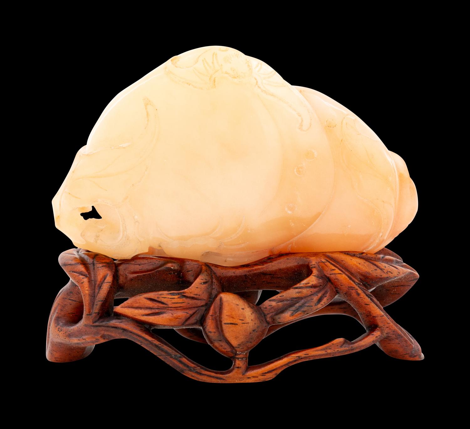 A Chinese Yellow Jade Carving of Peaches