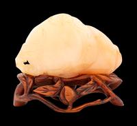 A Chinese Yellow Jade Carving of Peaches