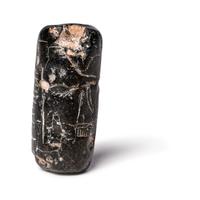 A Mesopotamian Black Steatite Cylinder Seal