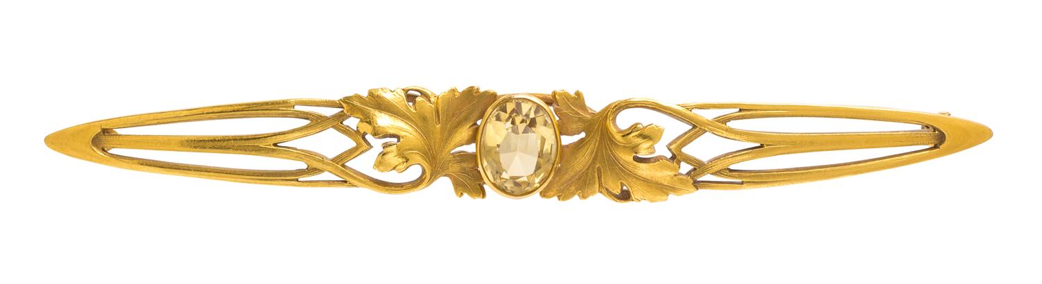 An Art Nouveau Yellow Gold and Citrine Bar Brooch, 6.90 dwts.
