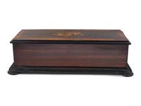 A Swiss Cylinder Music Box in a Rosewood and Marquetry Case