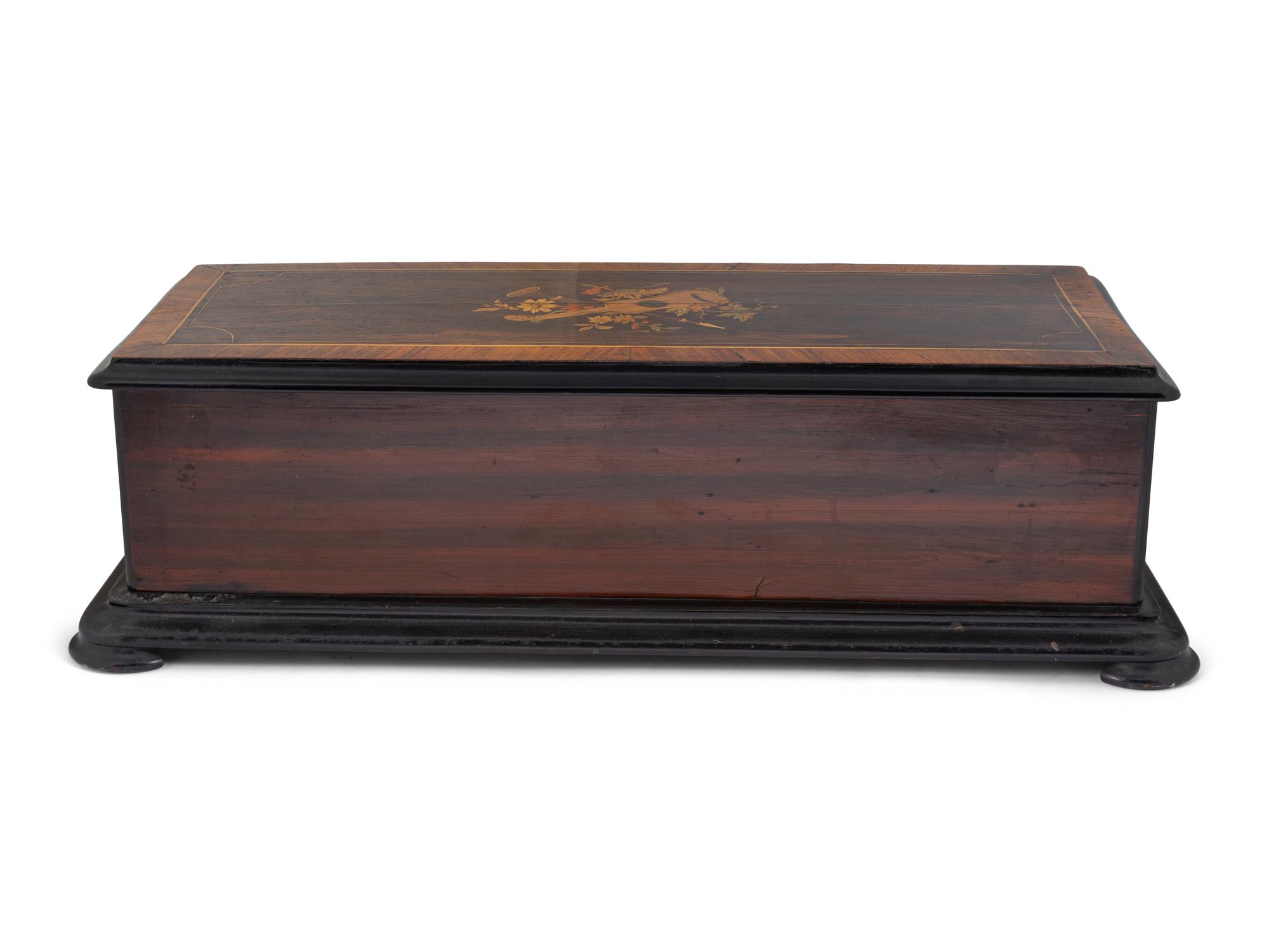 A Swiss Cylinder Music Box in a Rosewood and Marquetry Case
