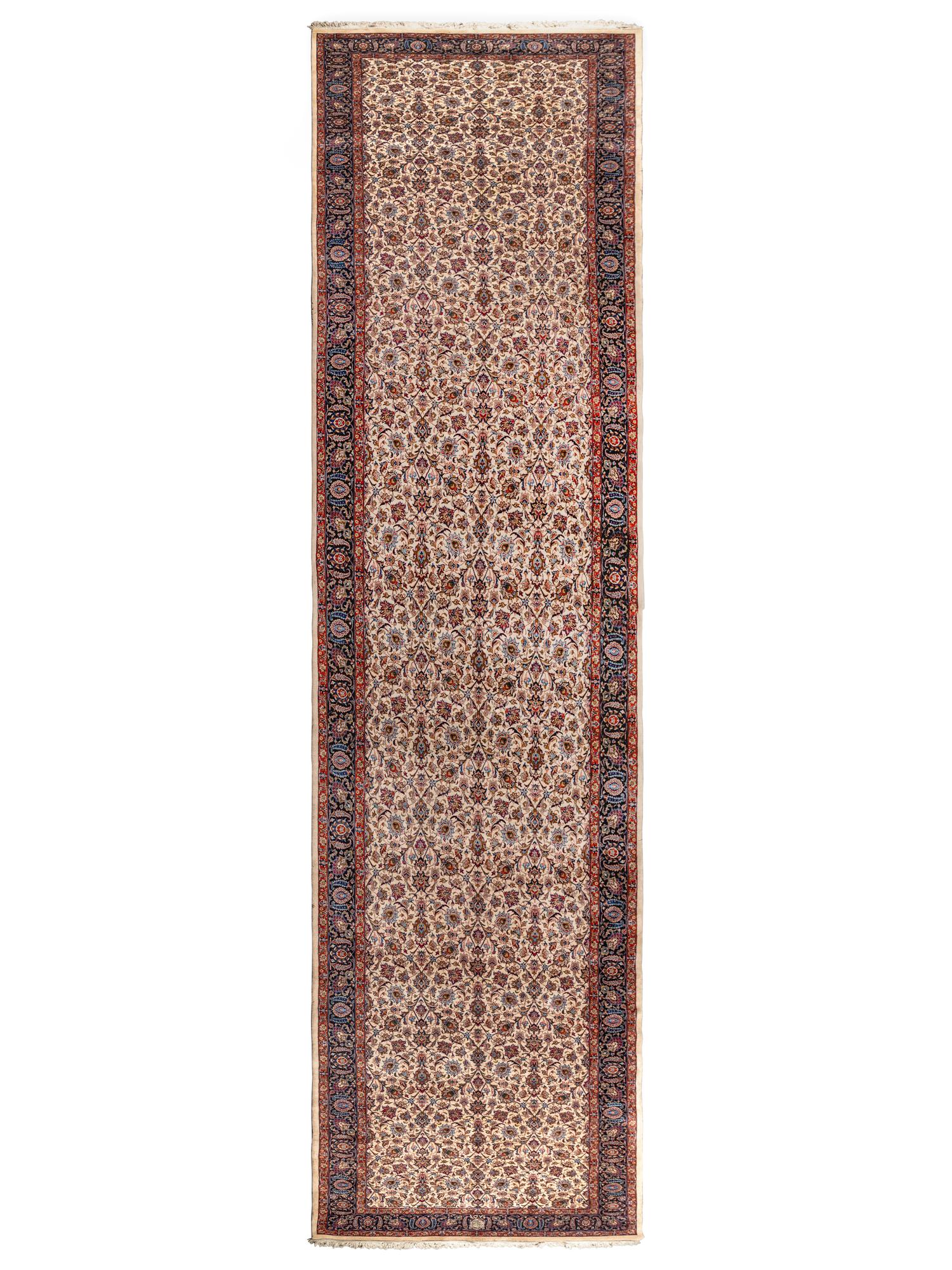 A Signed Persian Meshed Wool Rug