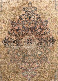A Kashan Silk Carpet