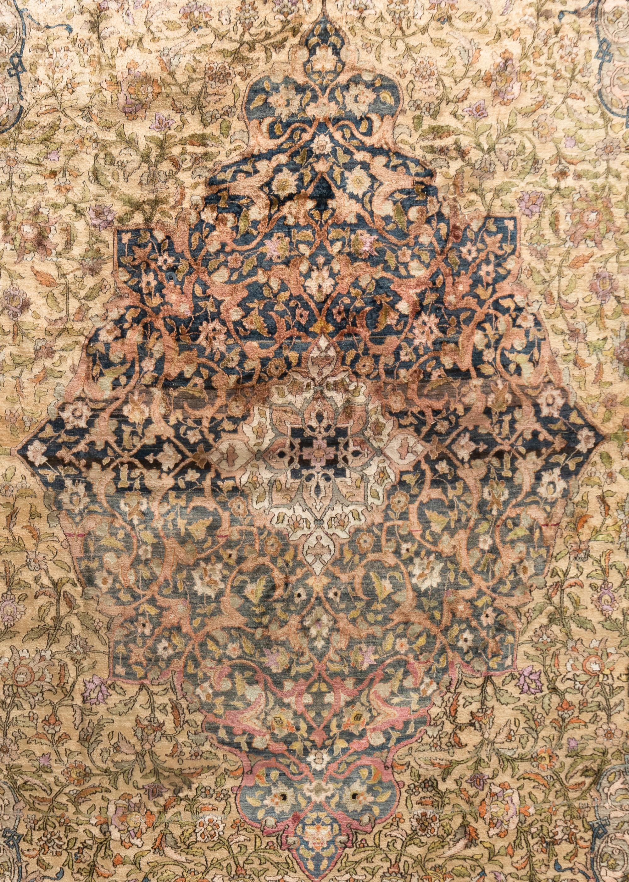 A Kashan Silk Carpet