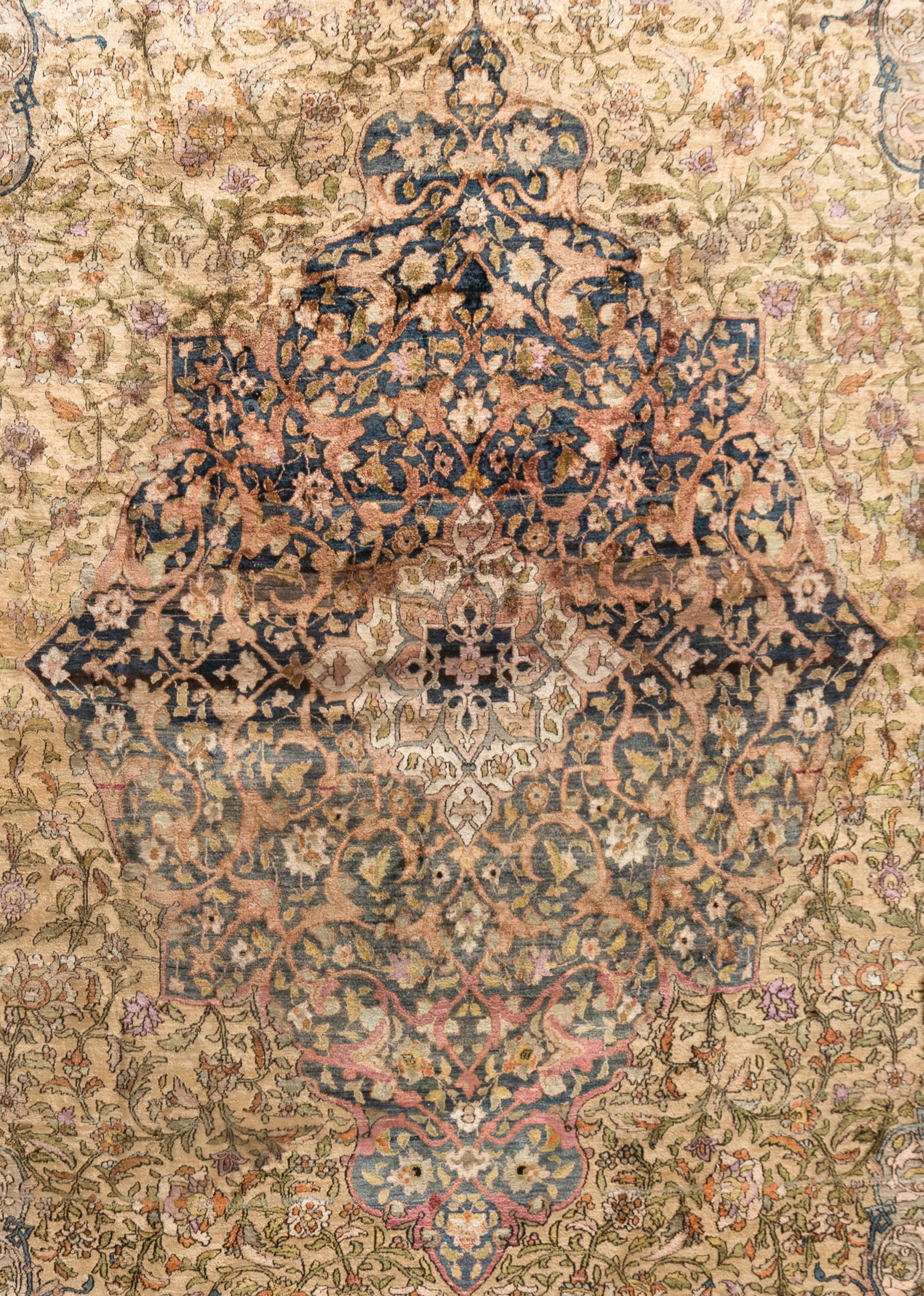 A Kashan Silk Carpet