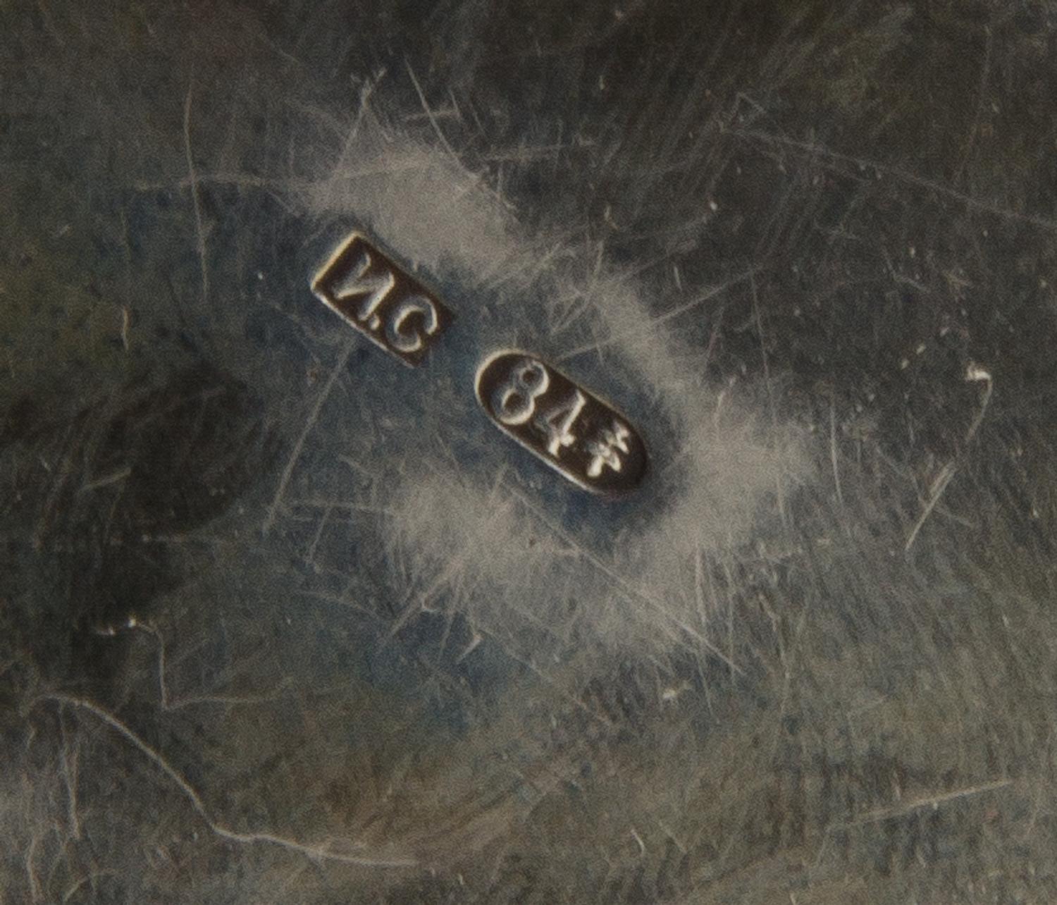 A Russian Silver and Enamel Pill Box, Maker's mark Cyrillic IS, city mark likely Odessa, of lobed, circular form and decorated with pol