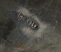 A Russian Silver and Enamel Pill Box, Maker's mark Cyrillic IS, city mark likely Odessa, of lobed, circular form and decorated with pol
