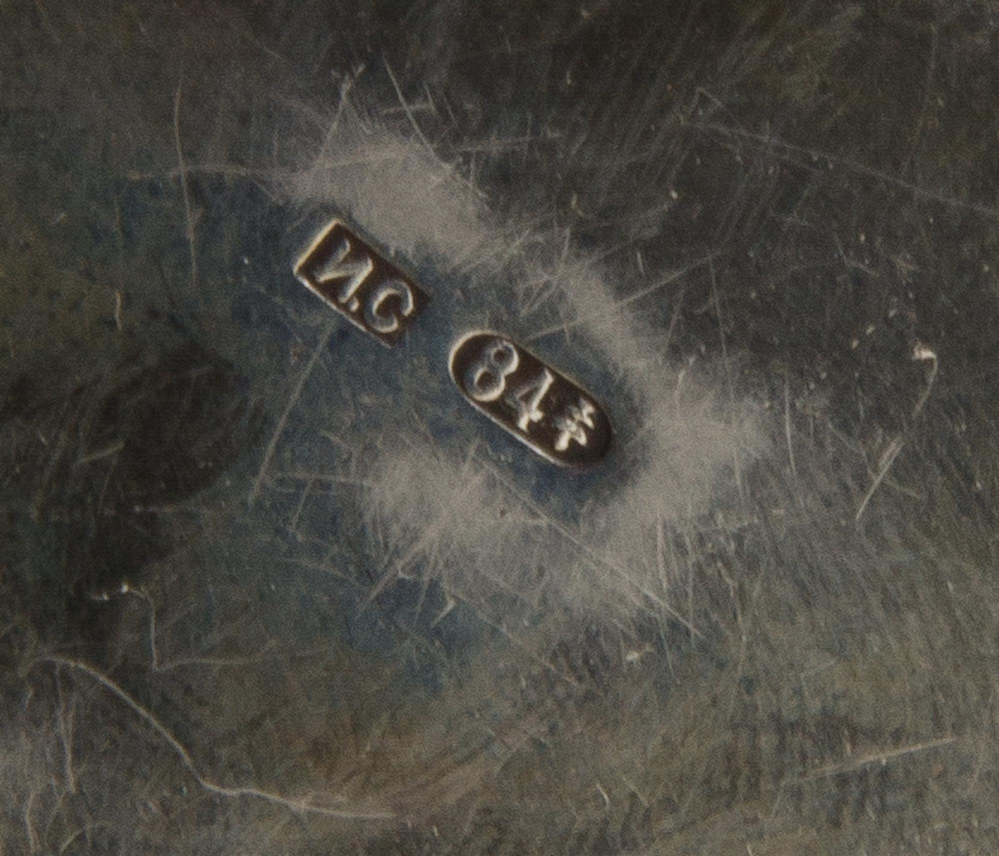 A Russian Silver and Enamel Pill Box, Maker's mark Cyrillic IS, city mark likely Odessa, of lobed, circular form and decorated with pol