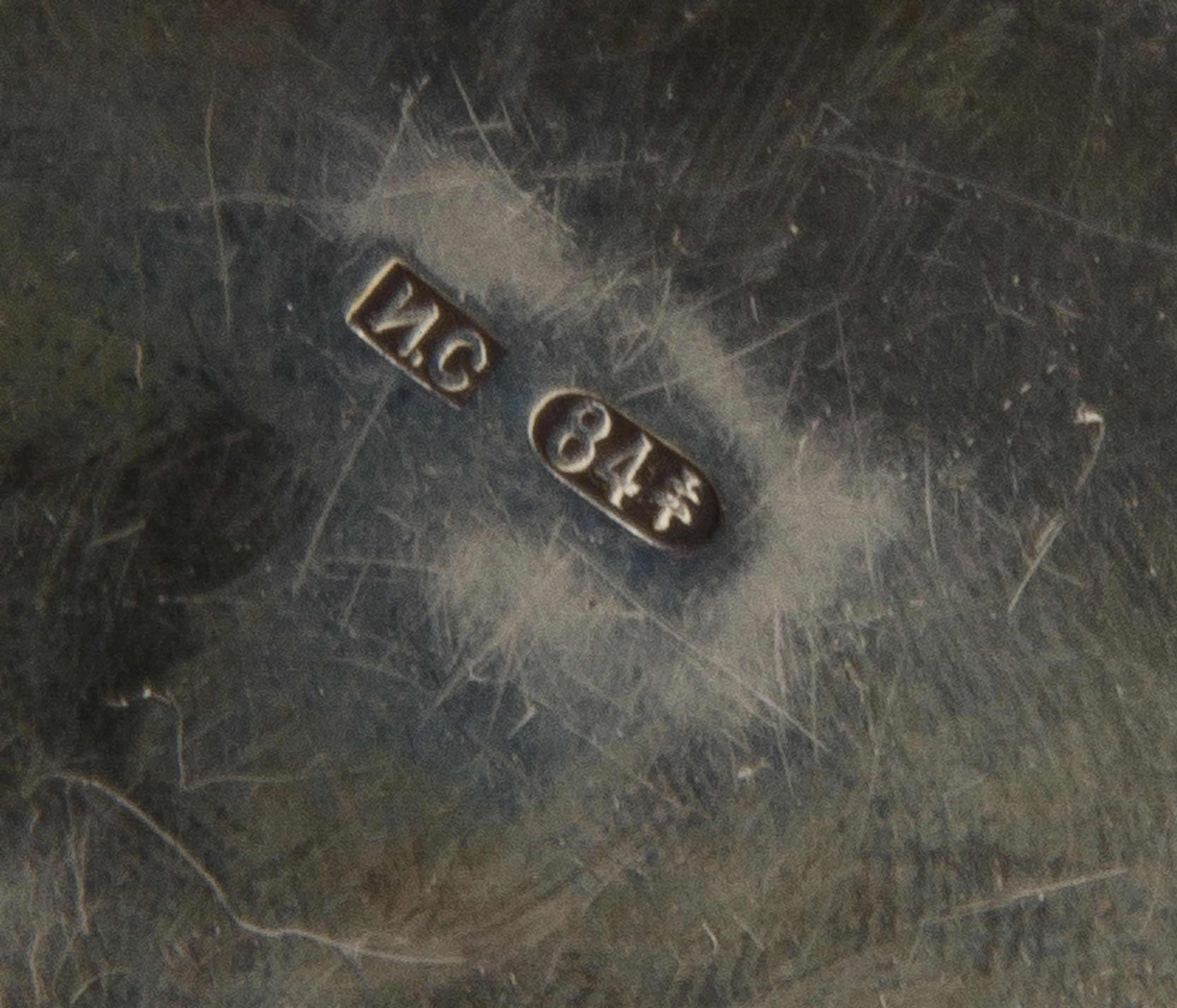 A Russian Silver and Enamel Pill Box, Maker's mark Cyrillic IS, city mark likely Odessa, of lobed, circular form and decorated with pol